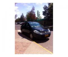 Vendo Colectivo Nissan Tiida 2011 con derechos