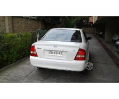 Mazda 323 año 2003