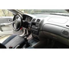 Mazda 323 año 2003