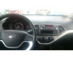 KIA Morning 1.2L 5MT DAB AC, año 2014, 31.000 kms, Única Dueña. Conversable!