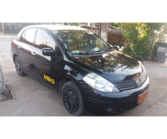 Vendo taxi nissan tiida 2011
