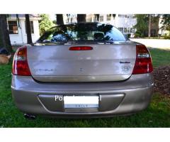 chrysler 300m o podria permutar