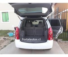 por traslado vendo auto mazda premacy año 2004